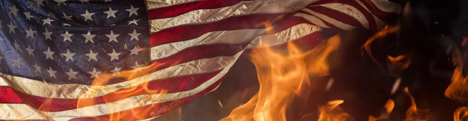 American flag waving with flames surrounding it